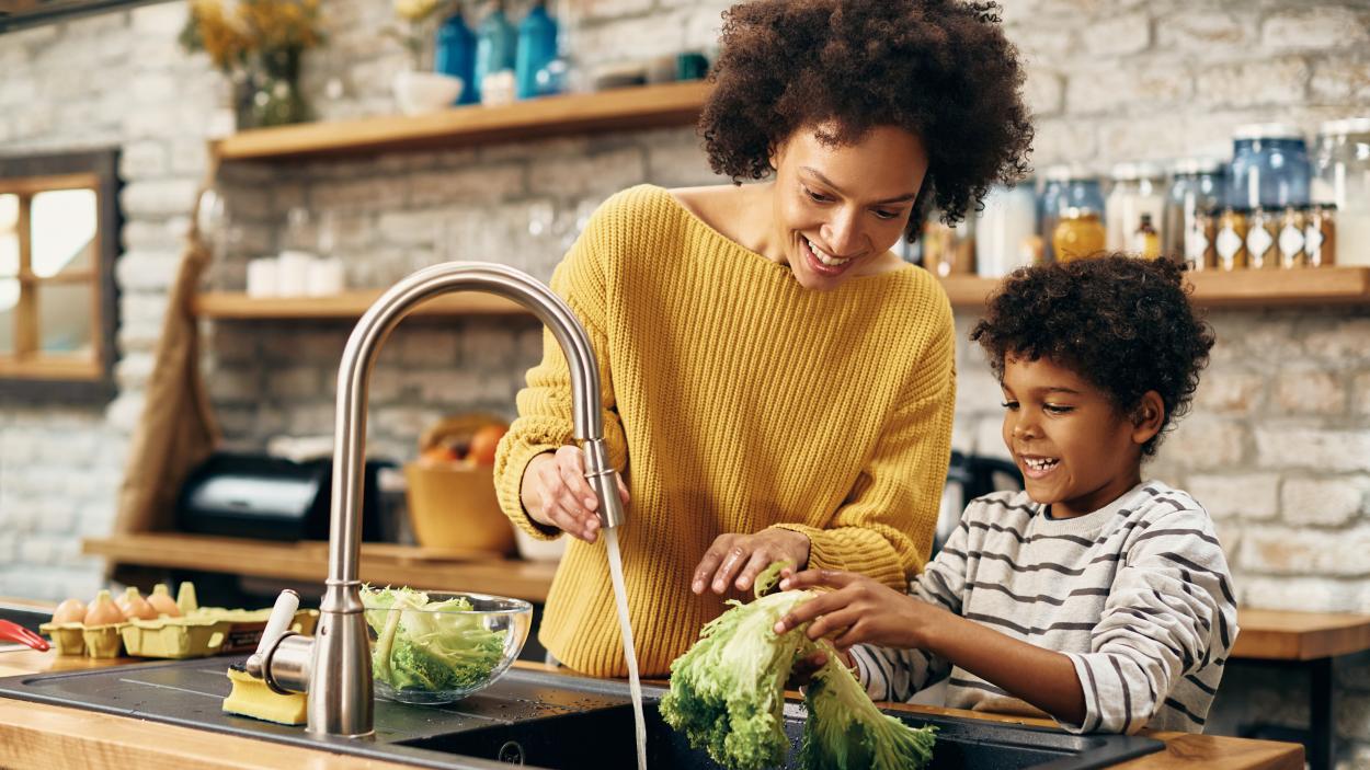 family at a sink