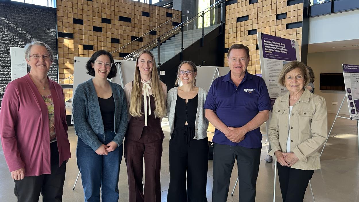 Lianne Sheppard, Cecila Martindale, Abby Gilbert, Hannah Dye, and the Casterners at a presentation. 