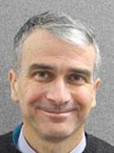 Headshot of Dr Bonauto, an older smiling white man with gray hair