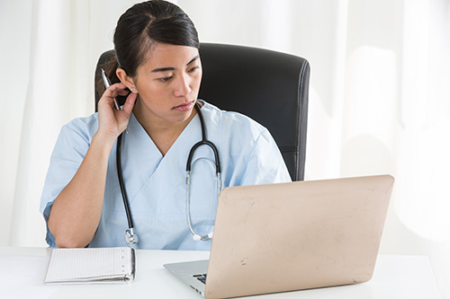 doctor on computer
