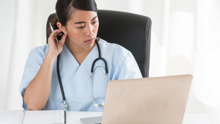 doctor on computer